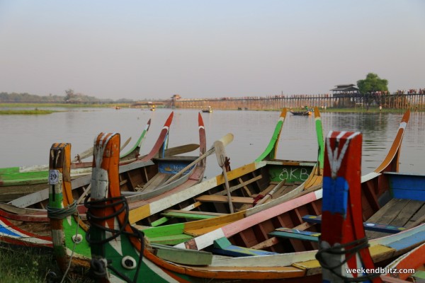 Colorful boats on the lake near U Bein Bridge