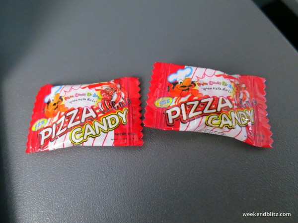 Our in-flight snack: Cola flavored "Pizza Candy"...wtf?