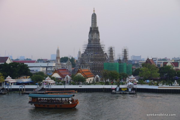 The views of Wat Arun from Eagle Nest's rooftop deck